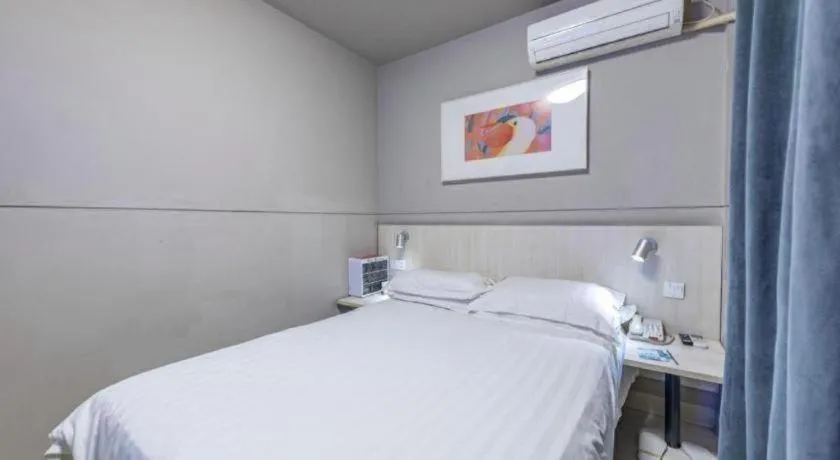 Bed in Jinjiang Inn Cixi Intime City Shanglinfang Pedestrian Street