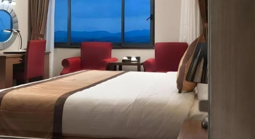 Bed in Royal Palace Hotel