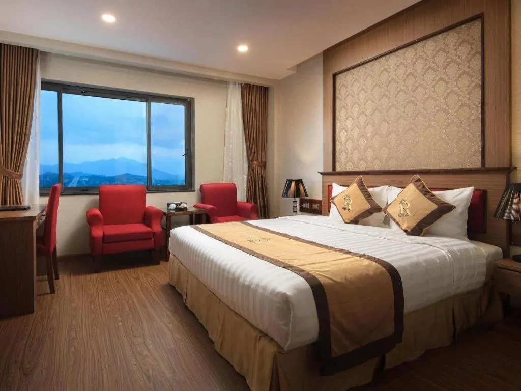 Bed in Royal Palace Hotel