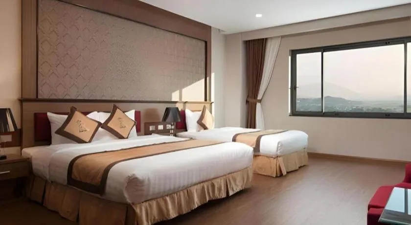 Bed in Royal Palace Hotel