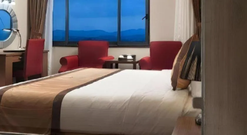 Bed in Royal Palace Hotel