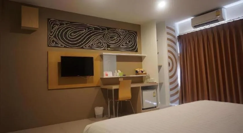 Bed in The Rice Hotel