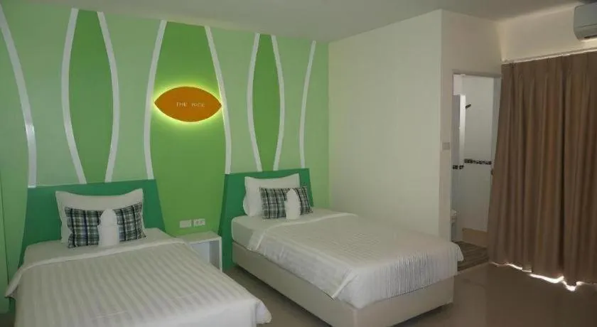 Bed in The Rice Hotel