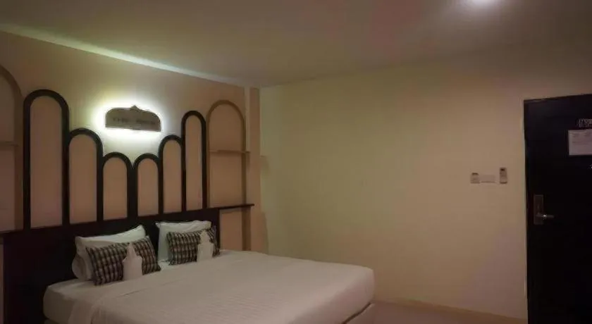 Bed in The Rice Hotel