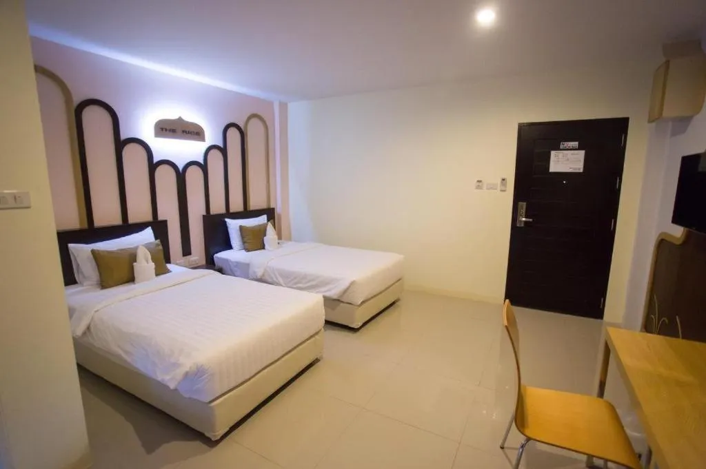 Bed in The Rice Hotel