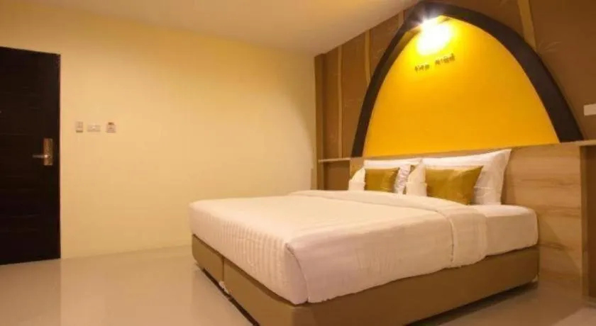 Bed in The Rice Hotel