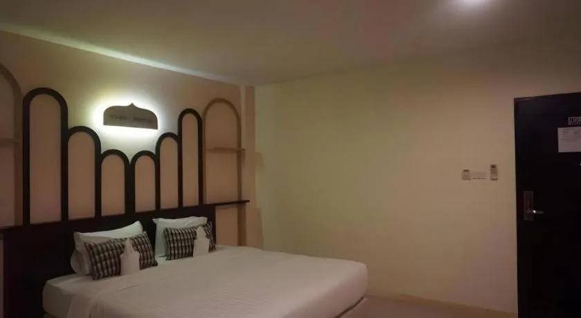 Bed in The Rice Hotel