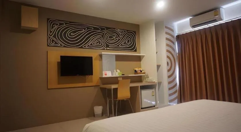 Bed in The Rice Hotel