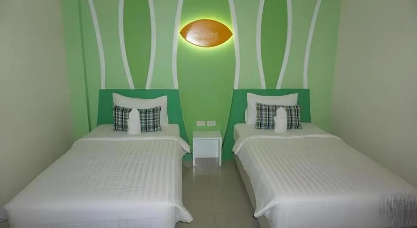 Bed in The Rice Hotel