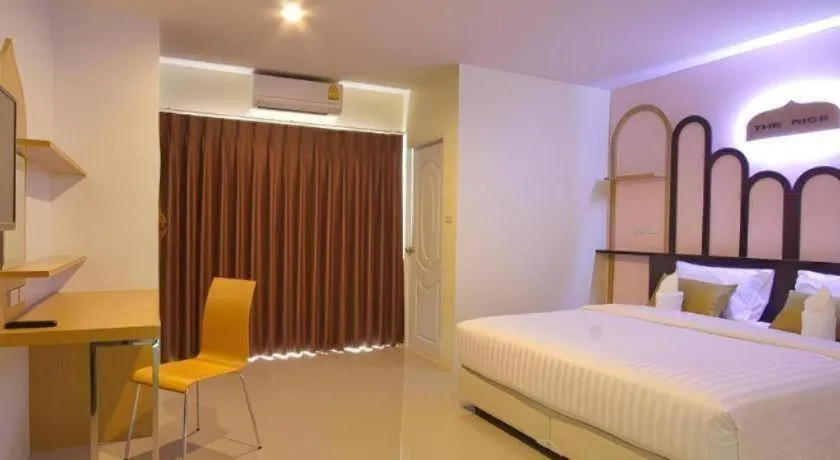 Bed in The Rice Hotel