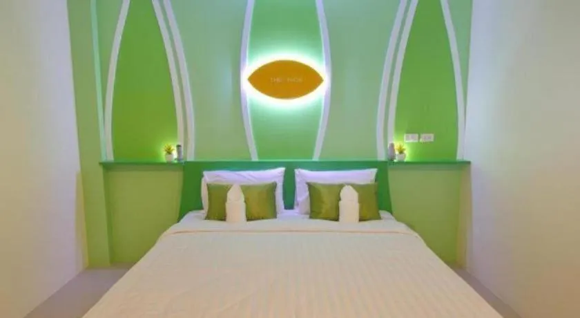 Bed in The Rice Hotel