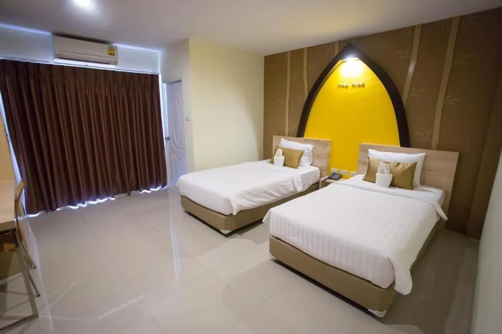 Bed in The Rice Hotel