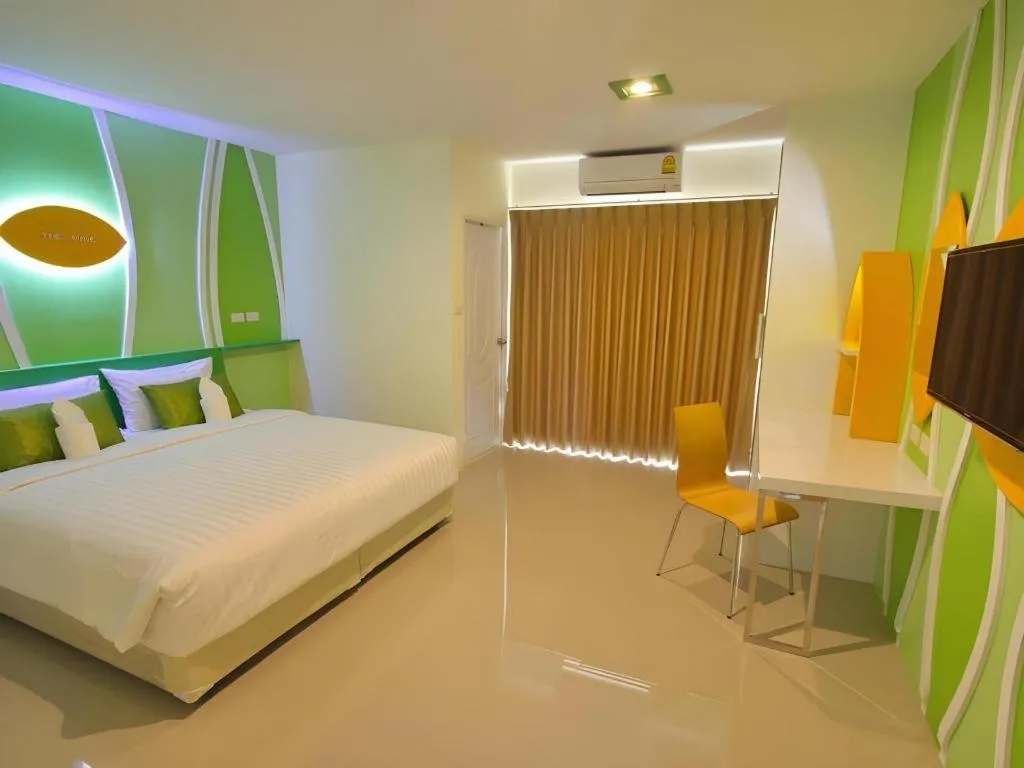 Bed in The Rice Hotel