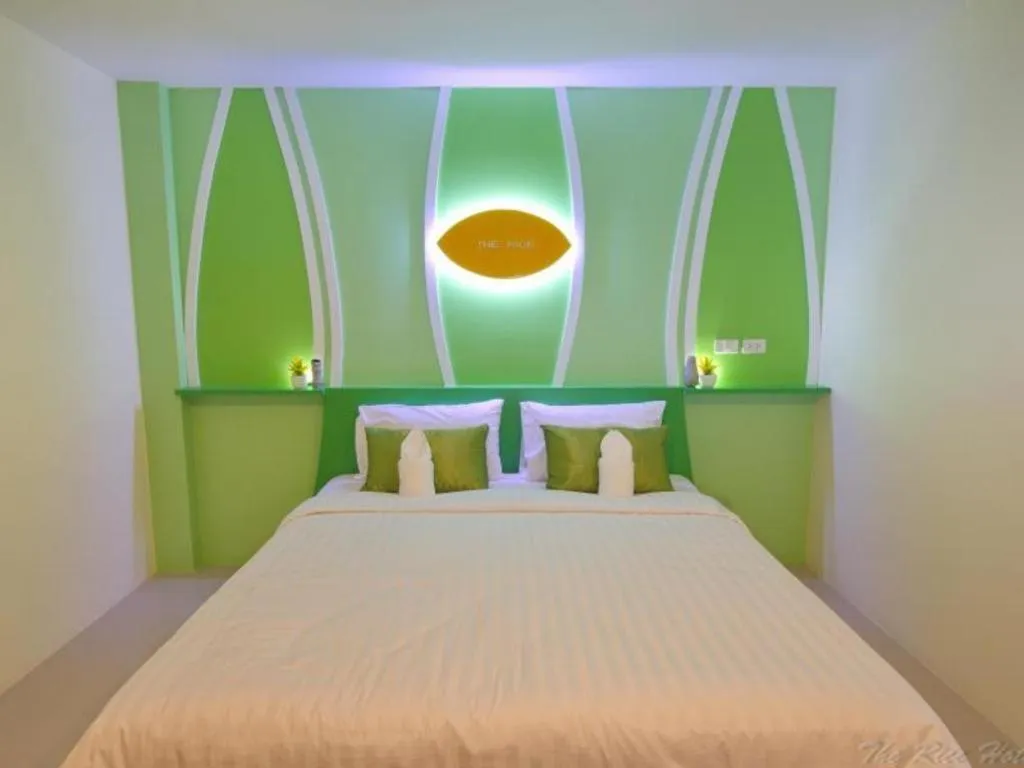 Bed in The Rice Hotel