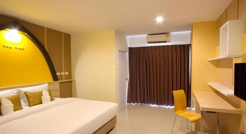 Bed in The Rice Hotel