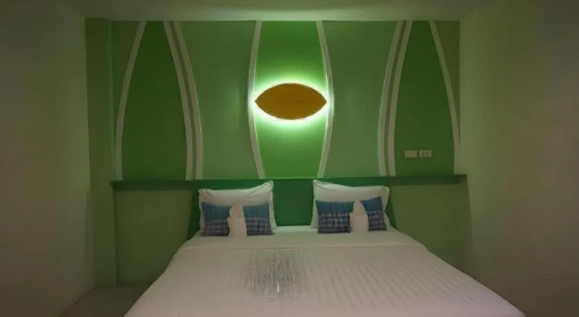 Bed in The Rice Hotel