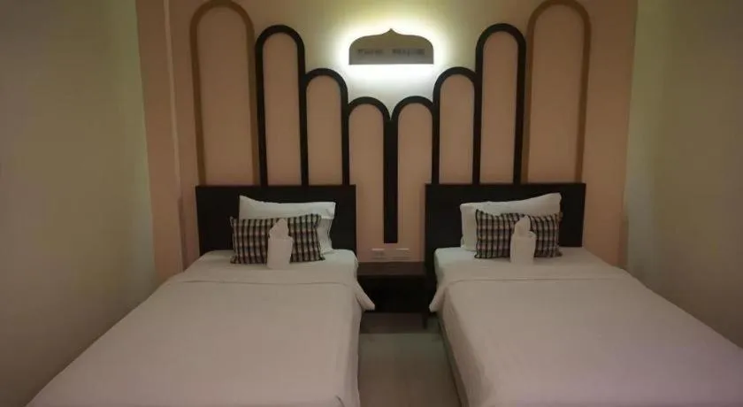 Bed in The Rice Hotel