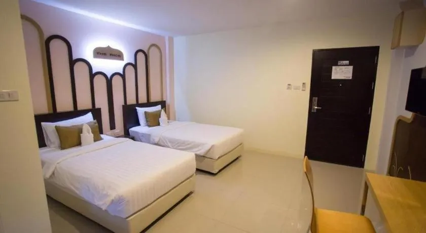 Bed in The Rice Hotel