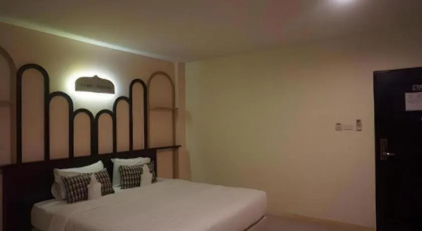 Bed in The Rice Hotel