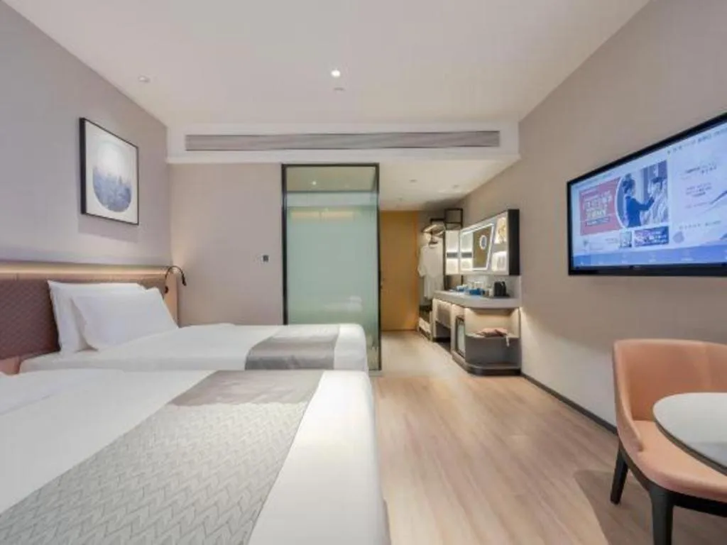 Bed in Home Inn Plus Shanghai Pudong Airport Chuansha Branch