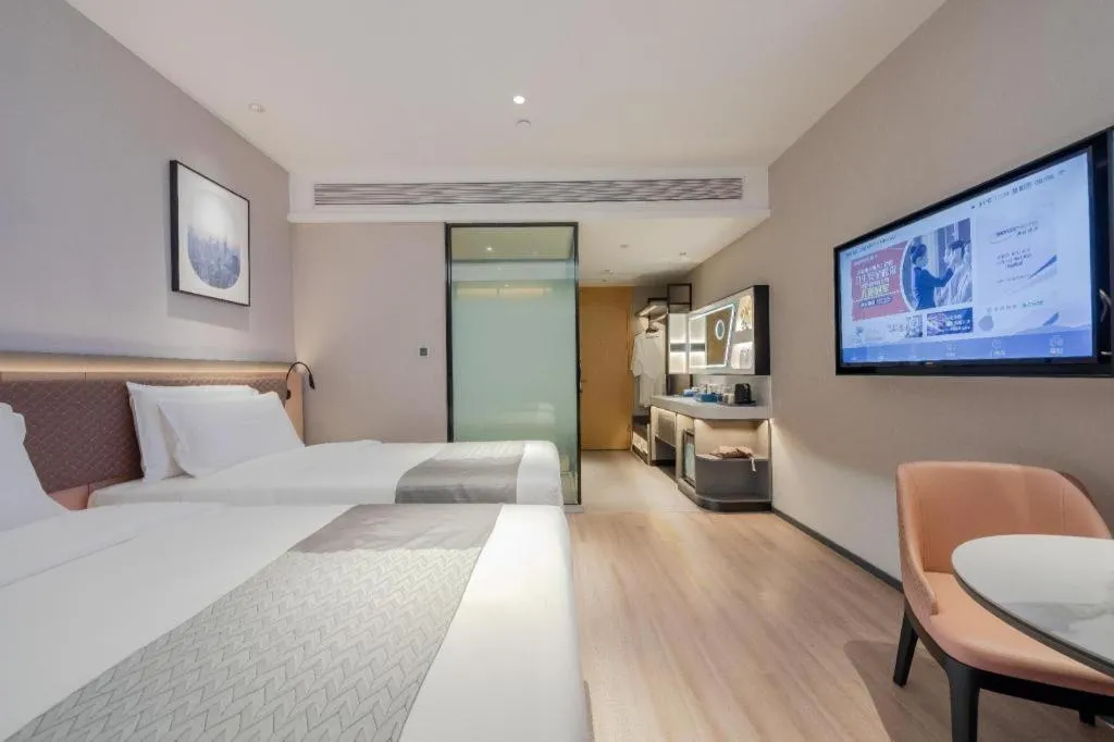 Bed in Home Inn Plus Shanghai Pudong Airport Chuansha Branch