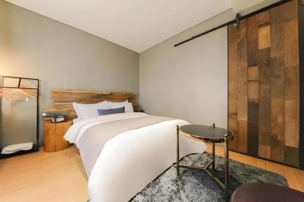 Bed in Daejeon Namoo Hotel