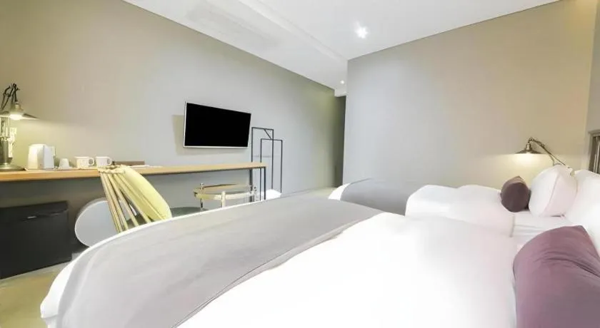 Bed in Daejeon Namoo Hotel