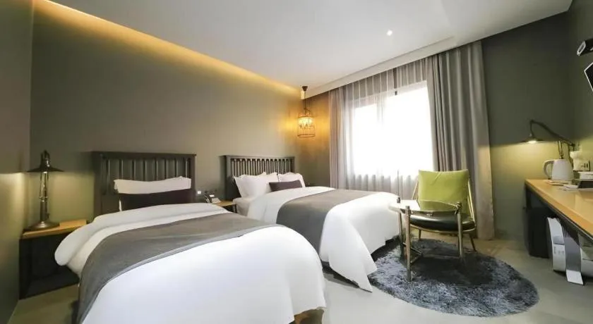 Bed in Daejeon Namoo Hotel