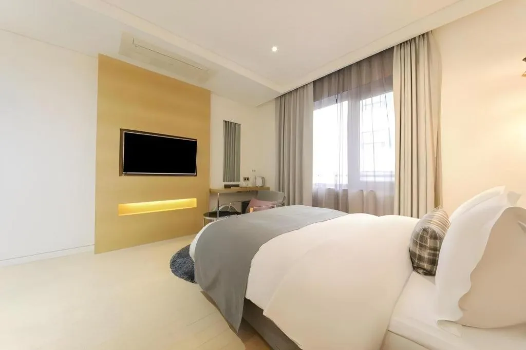 Bed in Daejeon Namoo Hotel