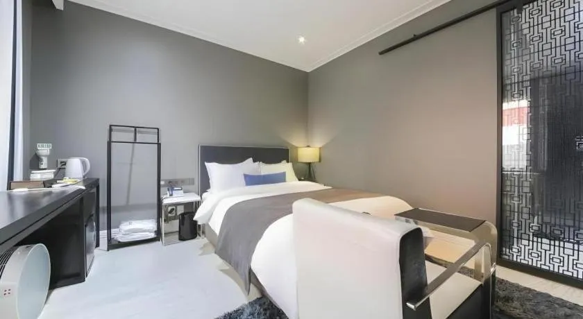 Bed in Daejeon Namoo Hotel