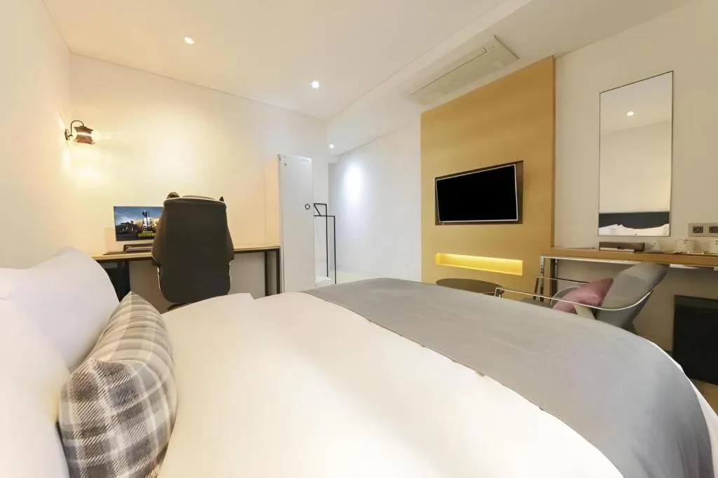 Bed in Daejeon Namoo Hotel