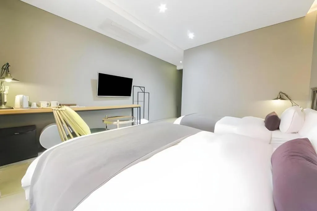 Bed in Daejeon Namoo Hotel