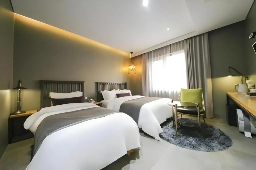 Bed in Daejeon Namoo Hotel