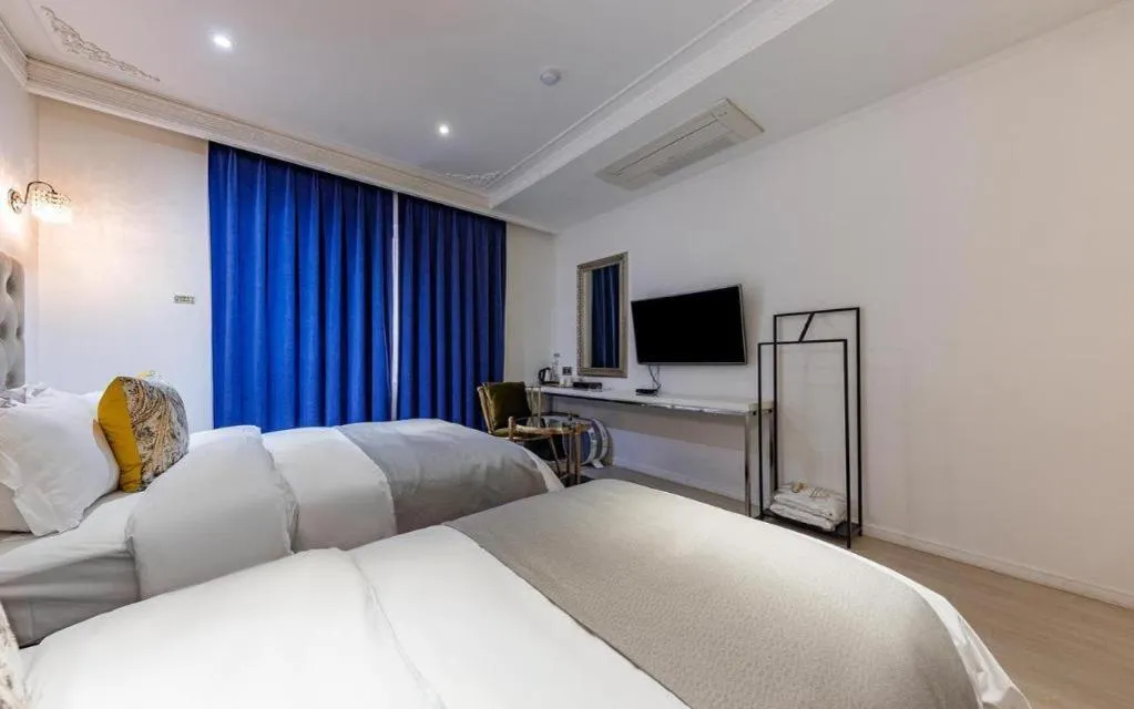 Bed in Daejeon Namoo Hotel