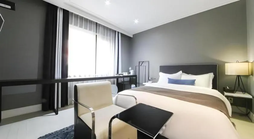 Bed in Daejeon Namoo Hotel