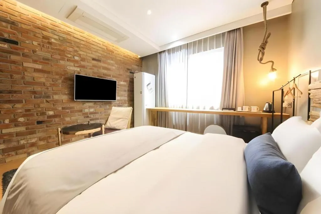 Bed in Daejeon Namoo Hotel