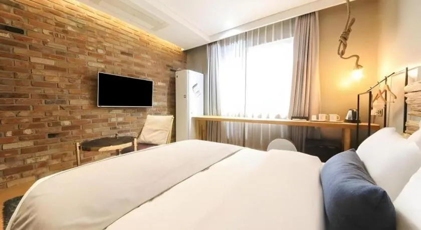 Bed in Daejeon Namoo Hotel