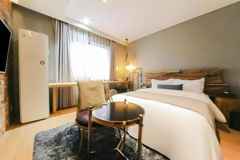 Bed in Daejeon Namoo Hotel