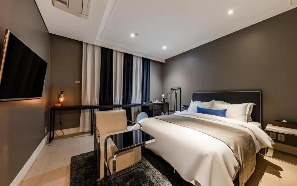 Bed in Daejeon Namoo Hotel