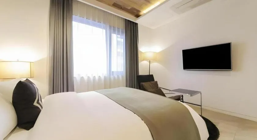 Bed in Daejeon Namoo Hotel