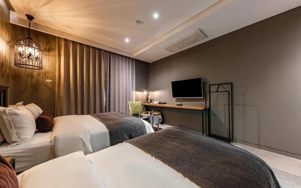 Bed in Daejeon Namoo Hotel