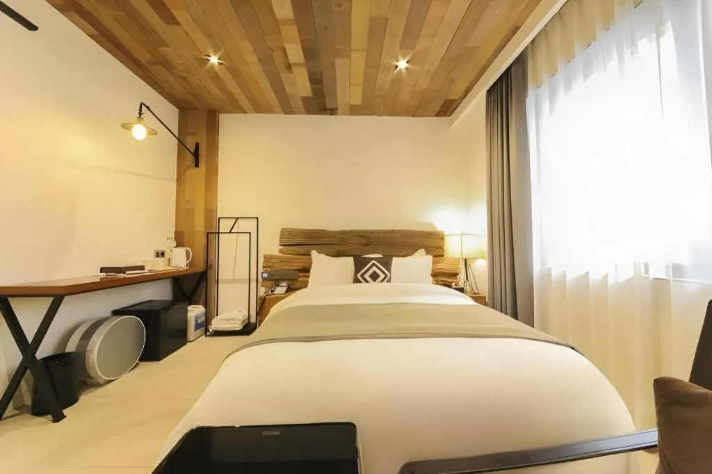 Bed in Daejeon Namoo Hotel