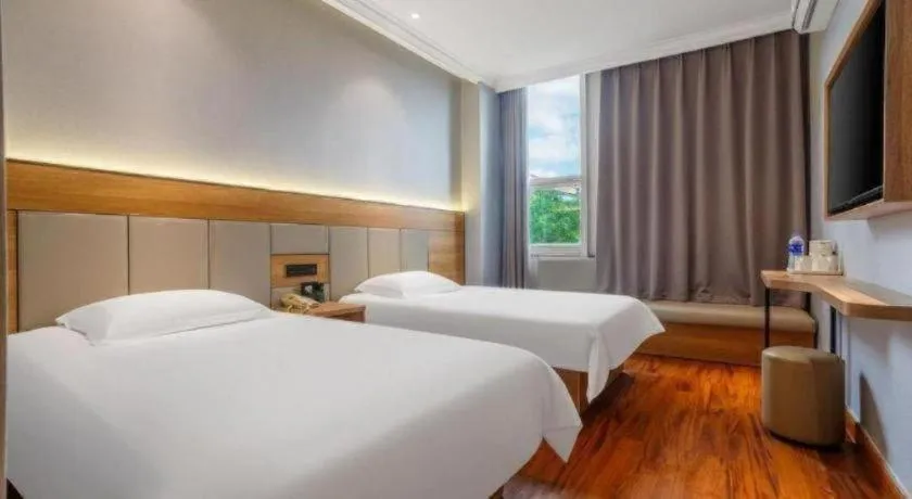 Bed in GreenTree Inn Shanghai Hongqiao Hub Convention Center Jinghua Road Shell Hotel