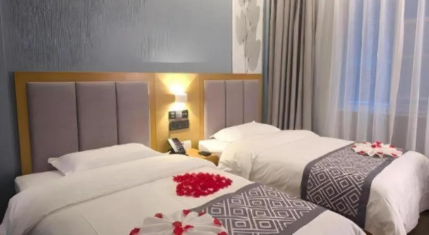 Bed in GreenTree Inn Puyang Ruifengyuan Business Hotel