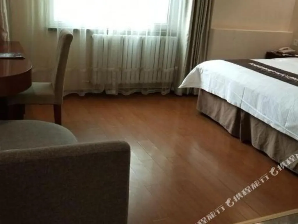 Bed in GreenTree Inn Beijing East Yizhuang District Second Kechuang Street Express Hotel