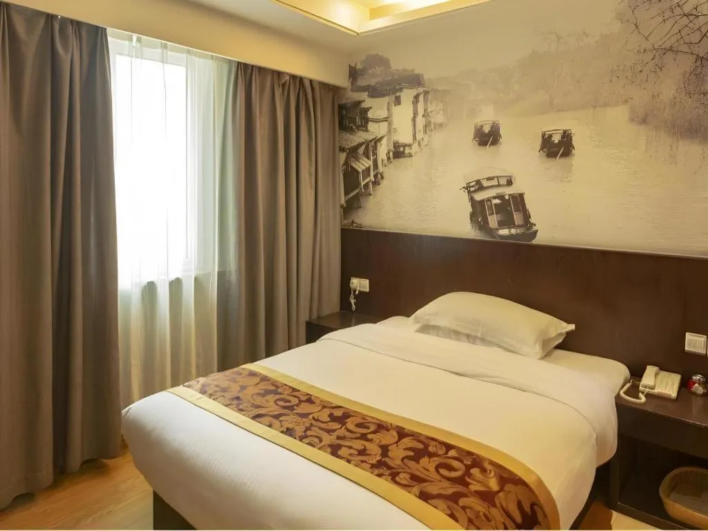 Bed in GreenTree Inn Huzhou South Street Chaoyin Bridge Business Hotel