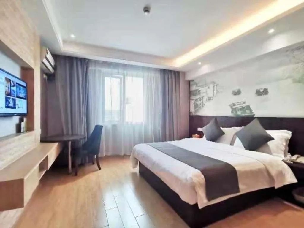 Bed in GreenTree Inn Huzhou South Street Chaoyin Bridge Business Hotel