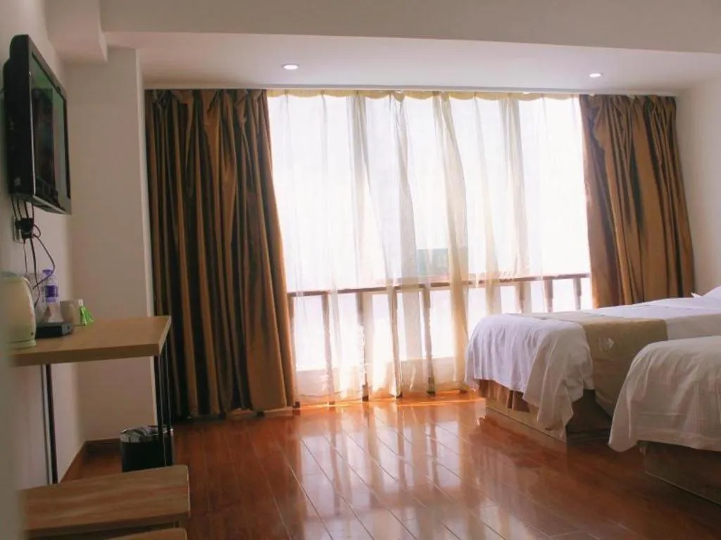 Bed in GreenTree Inn Changshu Zhaoshangcheng Express Hotel