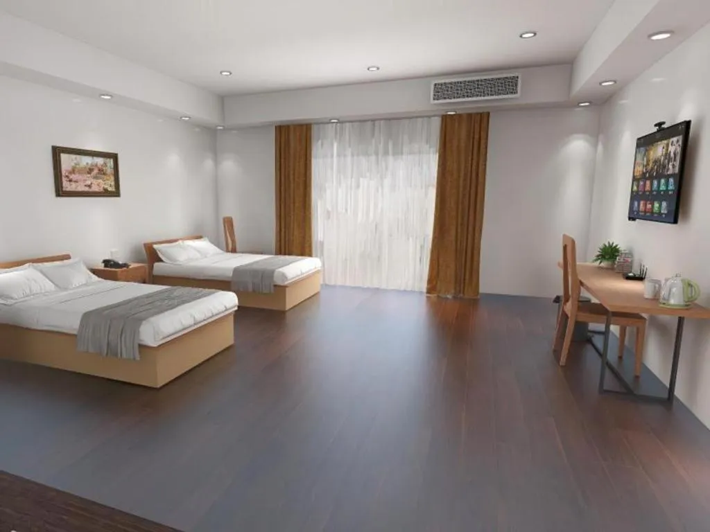 Bed in GreenTree Inn Changshu Zhaoshangcheng Express Hotel