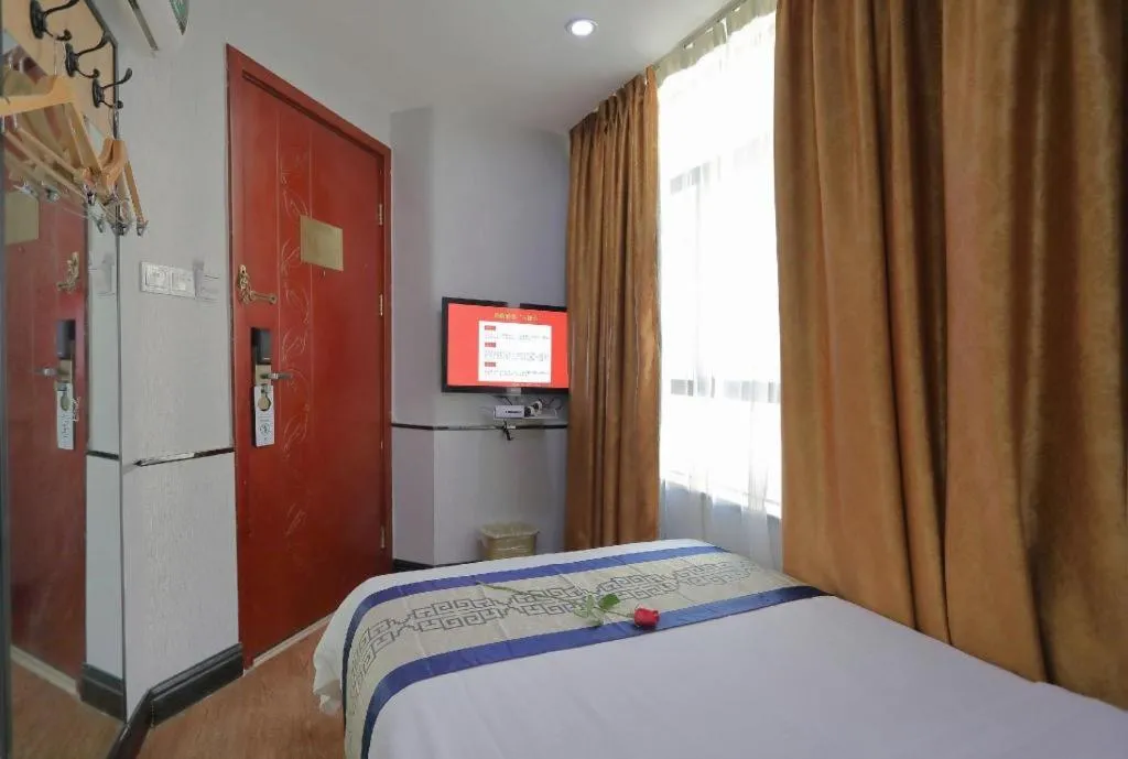 Bed in GreenTree Inn Jieyang North Linjiang Road Express Hotel